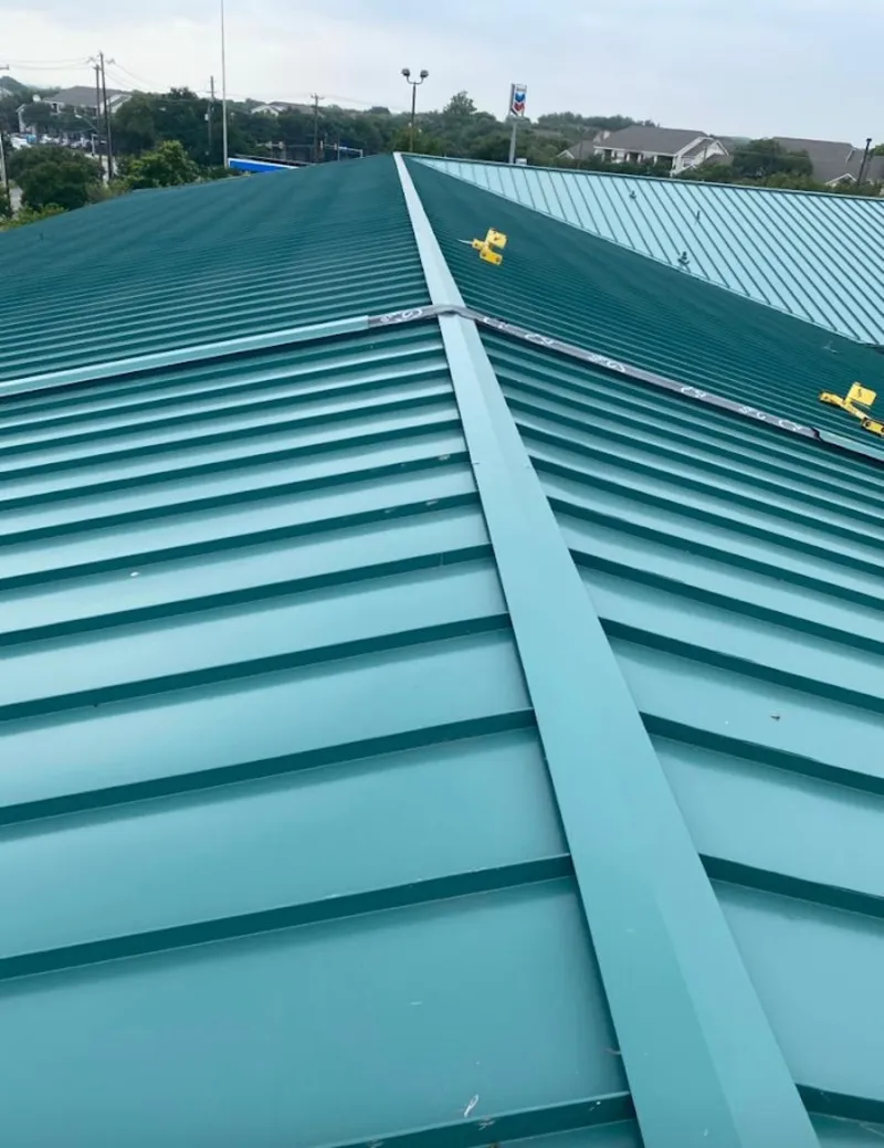 Green commercial metal roof ridge and valley for Metal Roof Repair in River Grove