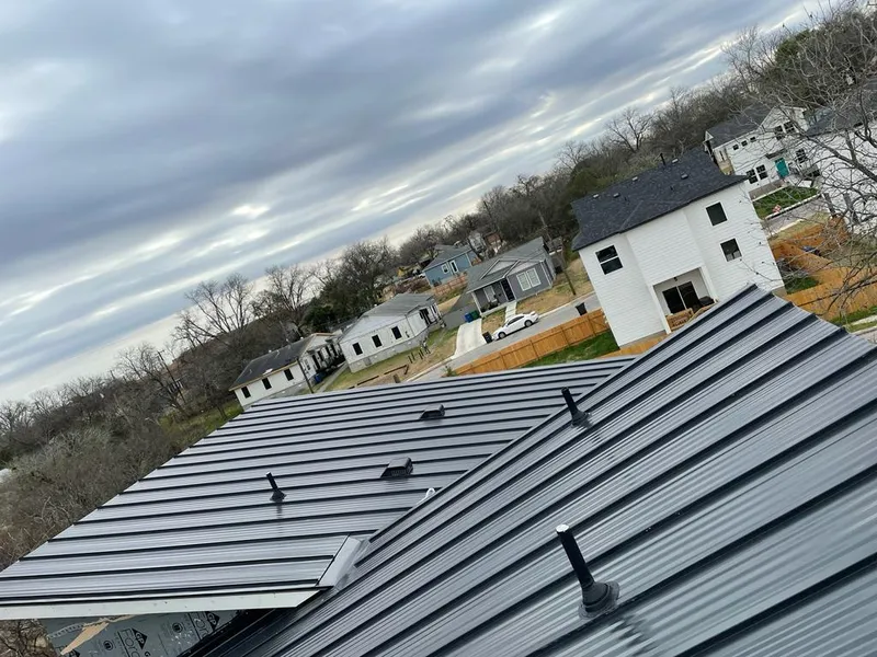 Standing seam metal roof panels with vents for Skylight Repair in River Grove